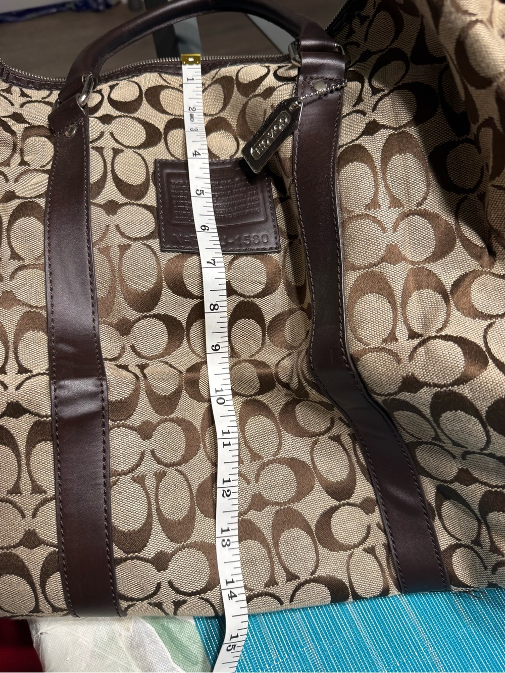 Coach duffle bag khaki/brown w/strap slight wear/tear. - Picture 14 of 14